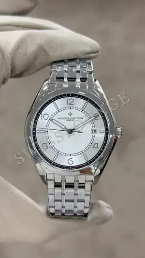 Grand Seiko GMT "SBGM" — 1. görsel