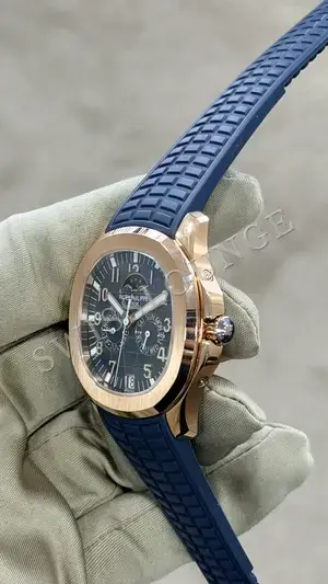 Patek Philippe Nautilus "GMT Moonphase Pembe Altın Kasa Mavi Kadran" — 6. görsel