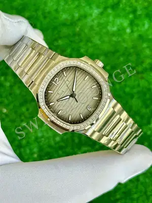 Patek Philippe Nautilus "Pembe Kadran Rose Kasa Full Tas Bezel" — 2. görsel