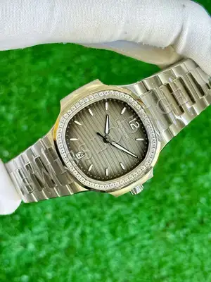 Patek Philippe Nautilus "Pembe Kadran Rose Kasa Full Tas Bezel" — 3. görsel