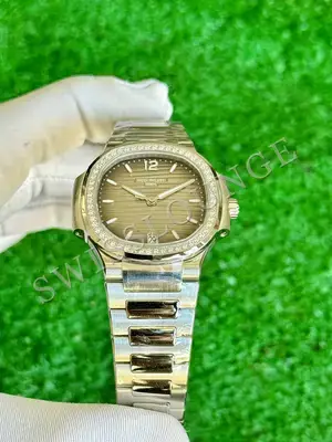 Patek Philippe Nautilus "Pembe Kadran Rose Kasa Full Tas Bezel" — 4. görsel